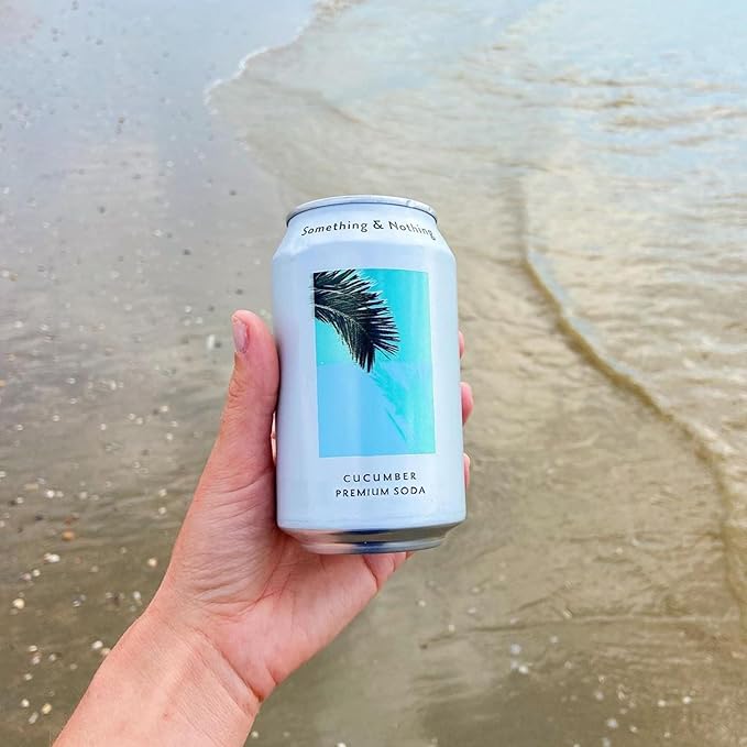 Something & Nothing Flavoured Sparkling Water - Lightly Carbonated, Full Flavoured with Added Grape & Lemon Juice | Vegan & Low Calorie Soda | 355ml Cans, Pack of 12 (Cucumber)