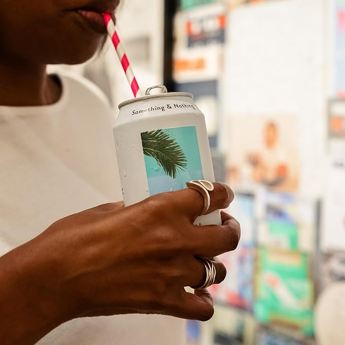 Something & Nothing Flavoured Sparkling Water - Lightly Carbonated, Full Flavoured with Added Grape & Lemon Juice | Vegan & Low Calorie Soda | 355ml Cans, Pack of 12 (Cucumber)