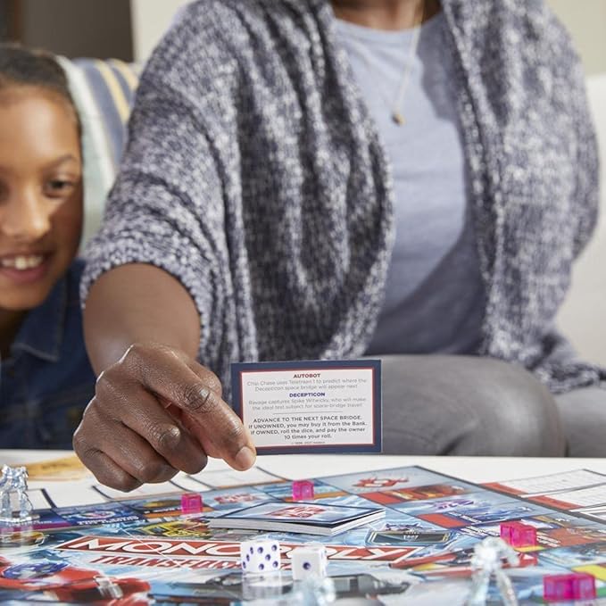 Monopoly: Transformers Edition Board Game for 2-6 Players Kids Ages 8 and Up, Includes Autobot and Decepticon Tokens