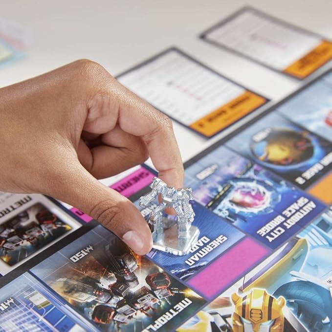 Monopoly: Transformers Edition Board Game for 2-6 Players Kids Ages 8 and Up, Includes Autobot and Decepticon Tokens