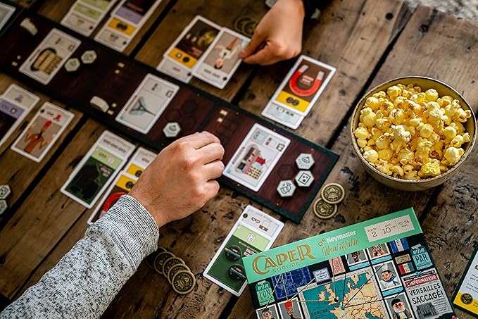 Caper Europe | Strategic Two-Player Board Game for Ages 10+ | Fast-Paced Card Drafting Heist Across Europe | Travel-Friendly Box with Stunning Art | Perfect for Couples and Family Game Night